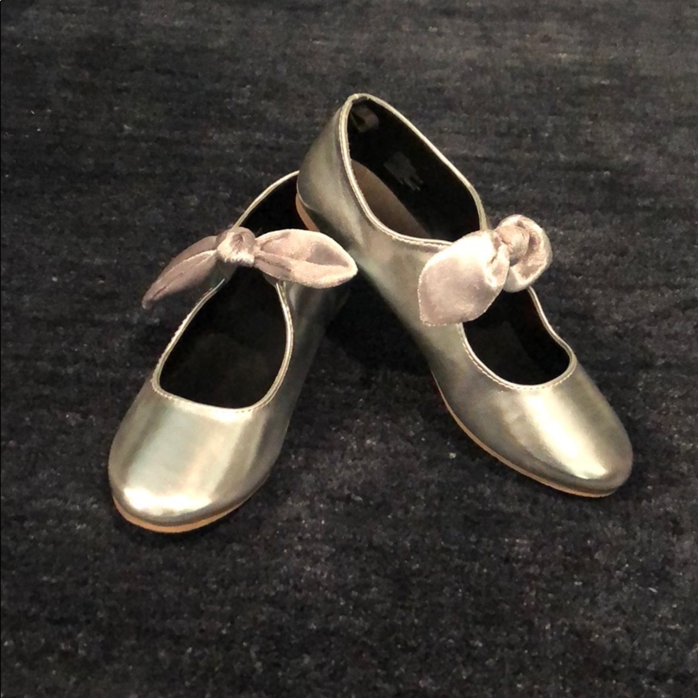 Silver Shoes with a cute bow.